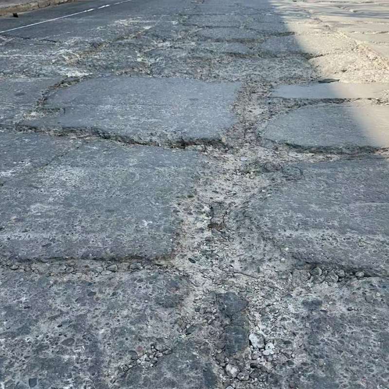 泸西路面起砂露石子修补料